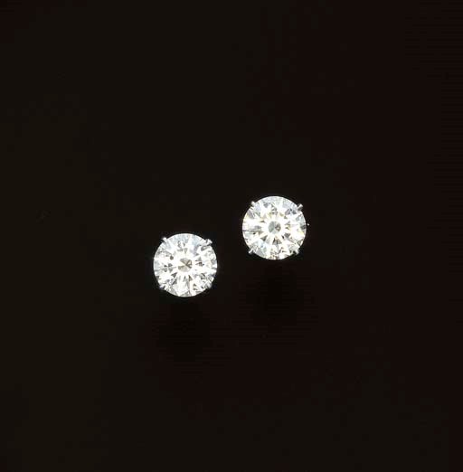 A PAIR OF DIAMOND SINGLE-STONE EAR STUDS