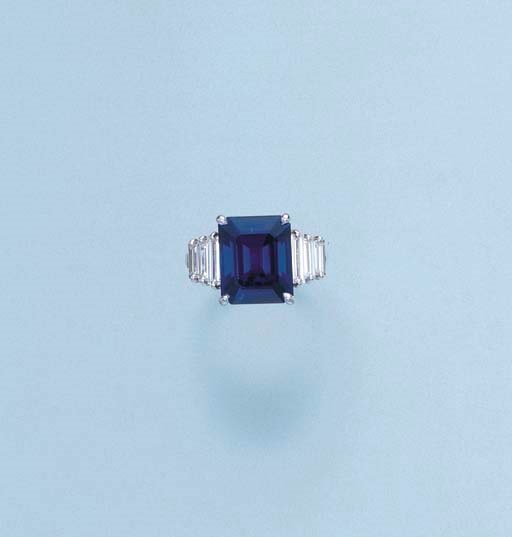 A SAPPHIRE AND DIAMOND RING