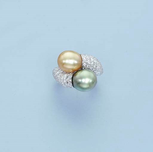 A CULTURED PEARL AND DIAMOND CROSS-OVER RING