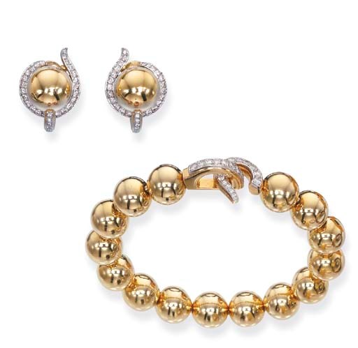 A GOLD AND DIAMOND SET, BY CARTIER