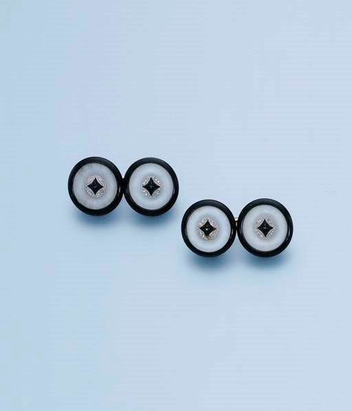 A PAIR OF ART DECO ENAMEL, ROCK CRYSTAL AND DIAMOND CUFF LINKS, BY CARTIER
