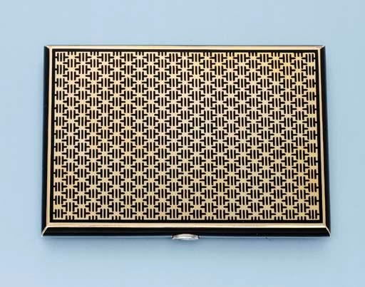 AN ART DECO GOLD AND ENAMEL CIGARETTE CASE, BY CARTIER