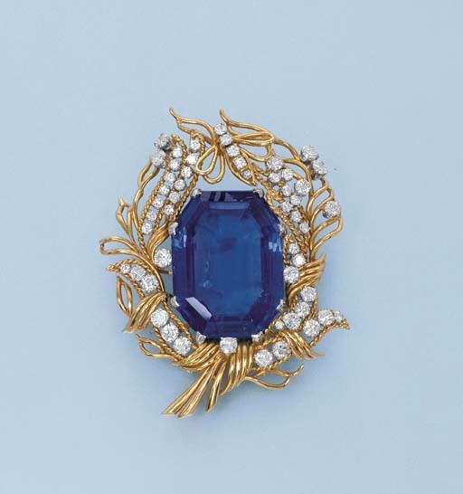 A SAPPHIRE AND DIAMOND BROOCH