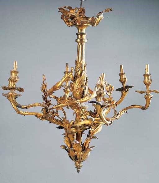 LAMPADARIO A SEI LUCI IN METALLO DORATO,