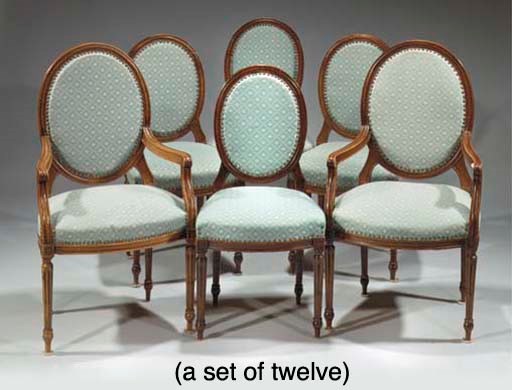 (24)  A set of twelve Dutch stained beech dining-chairs