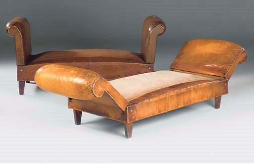 A MATCHED PAIR OF BROWN LEATHER DAY BEDS WITH RECLINING ENDS