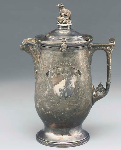 A VICTORIAN SILVER-PLATED AND PORCELAIN LINED ICE PITCHER