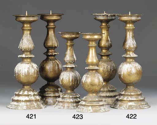 A PAIR OF BAROQUE STYLE BRASS PRICKET CANDLESTICKS