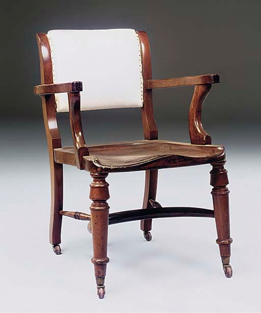 AN EARLY VICTORIAN MAHOGANY OPEN ARMCHAIR