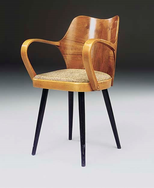 A LAMINATED WOOD AND BENTWOOD ARMCHAIR