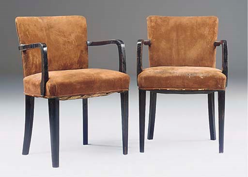 A PAIR OF ART DECO EBONISED OPEN ARMCHAIRS
