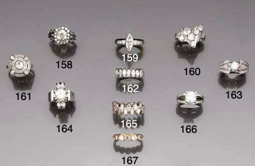 A marquise diamond single stone ring,