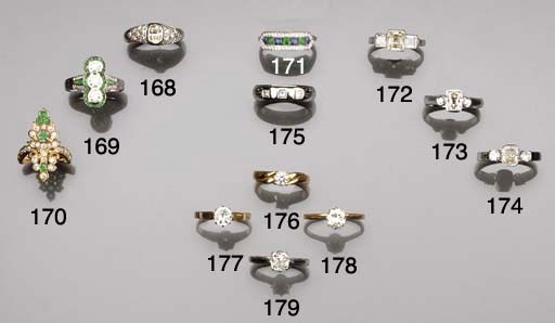 An American, emerald and diamond ring,