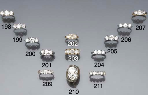 An old-brilliant-cut diamond three stone ring