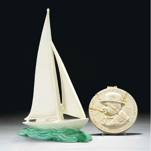A POOLE POTTERY RACING YACHT, PROBABLY DESIGNED BY JOHN ADAMS AND MODELLED BY HARRY BROWN, 1937-38
