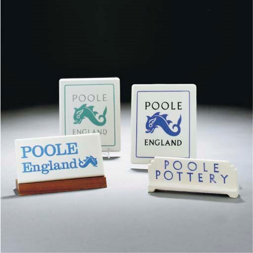 A GROUP OF POOLE POTTERY SIGNS