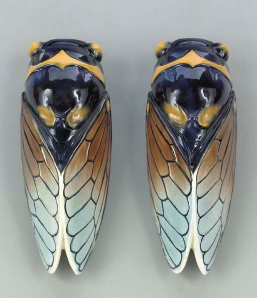 A PAIR OF MAJOLICA CICADA-FORM WALL POCKETS