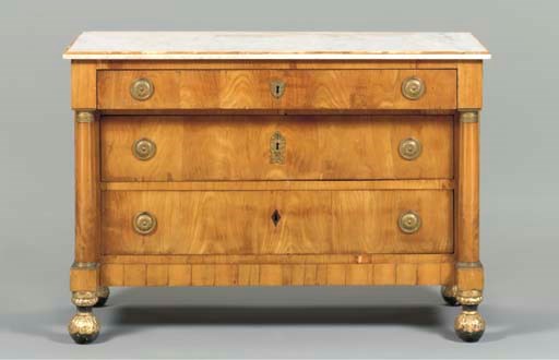 AN ITALIAN FRUITWOOD COMMODE