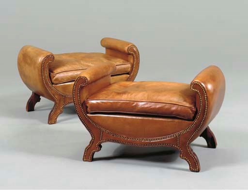 A PAIR OF CLOSE-NAILED BROWN LEATHER-UPHOLSTERED WINDOW BENCHES