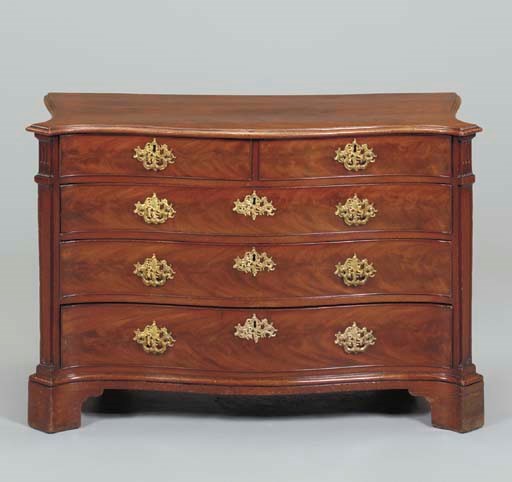 A GEORGE III MAHOGANY CHEST-OF-DRAWERS