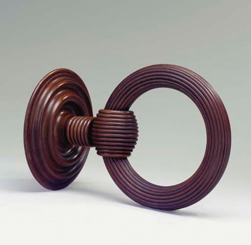A REGENCY MAHOGANY DRAPERY RING