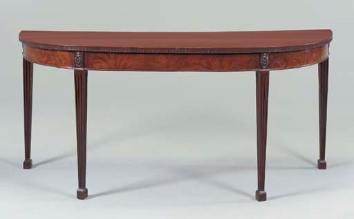 A GEORGE III MAHOGANY SERVING-TABLE