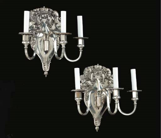 A PAIR OF ENGLISH SILVERED-METAL THREE-BRANCH WALL-LIGHTS
