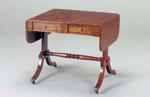 A REGENCY MAHOGANY AND CALAMANDER SOFA TABLE