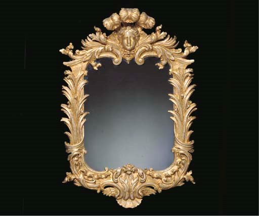 A GEORGE II GILTWOOD MIRROR