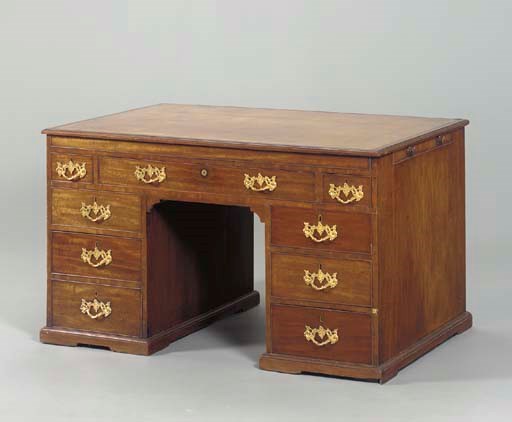 A LATE GEORGE III MAHOGANY PEDESTAL PARTNER'S DESK