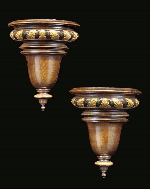 A PAIR OF PARCEL GILT MAHOGANY WALL BRACKETS