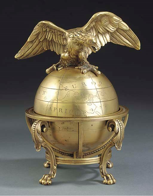 A FRENCH GILT BRASS INKWELL MODELLED AS A GLOBE