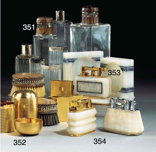 A PAIR OF HERMES SILVER GILT CIGARETTE CANISTERS