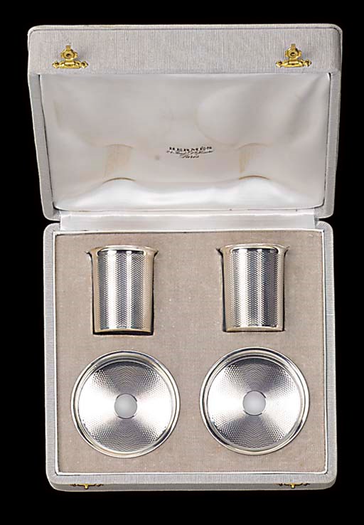 A PAIR OF HERMES CIGARETTE CANISTERS AND ASHTRAYS