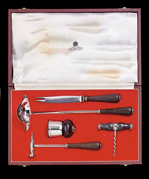 A CHRISTOFLE SILVER AND EBONY COCKTAIL SET