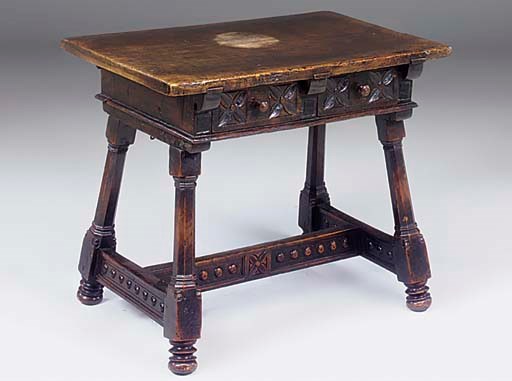 A SPANISH WALNUT CENTRE TABLE