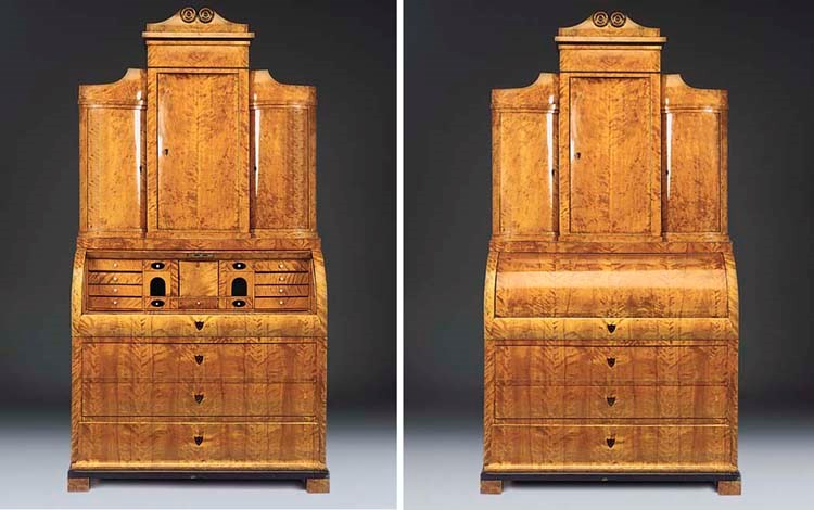 A BIEDERMEIER BIRCH AND EBONISED CYLINDER BUREAU CABINET