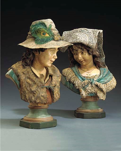 A PAIR OF AUSTRIAN POLYCHROME TERRACOTTA BUSTS