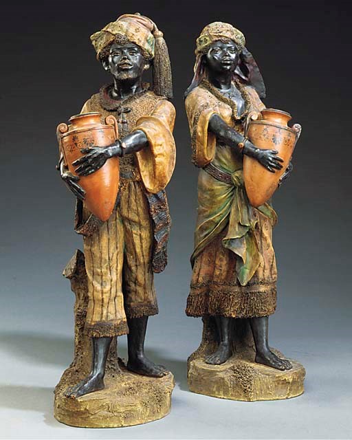 A PAIR OF AUSTRIAN POLYCHROME TERRACOTTA FIGURES