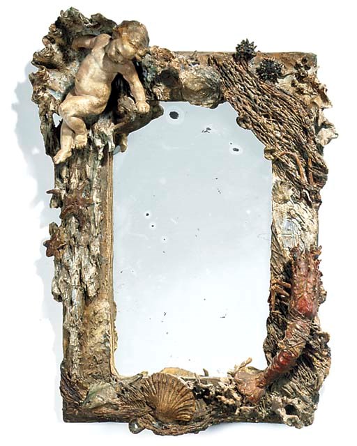 A POLYCHROME TERRACOTTA MIRROR