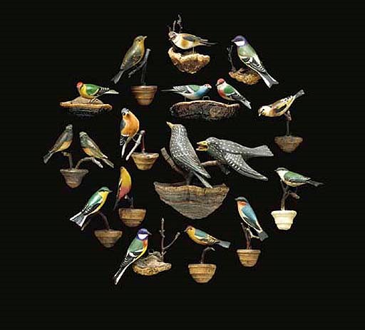 A GERMAN OR AUSTRIAN GROUP OF FIFTEEN POLYCHROME WOOD WALL APPLIQUES