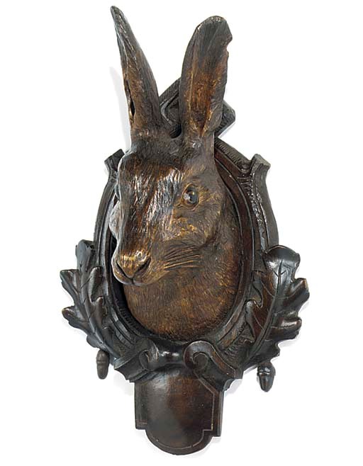 A SWISS 'BLACK FOREST' CARVED WOOD HARE WALL TROPHY