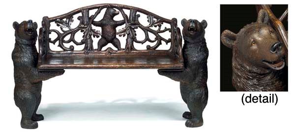 A SWISS 'BLACK FOREST' CARVED WOOD BEAR BENCH