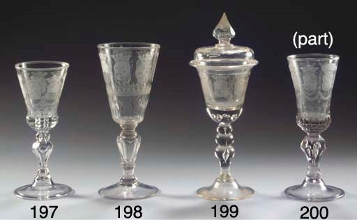 (2) A Dutch engraved armorial goblet and a faceted cover