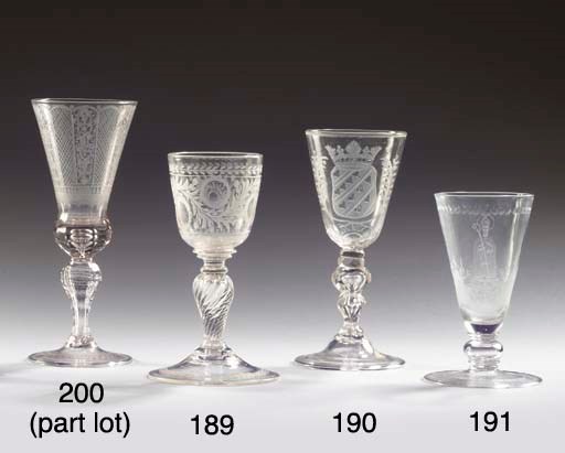 (2) A Dutch-engraved faceted armorial goblet and a Saxon engraved faceted goblet