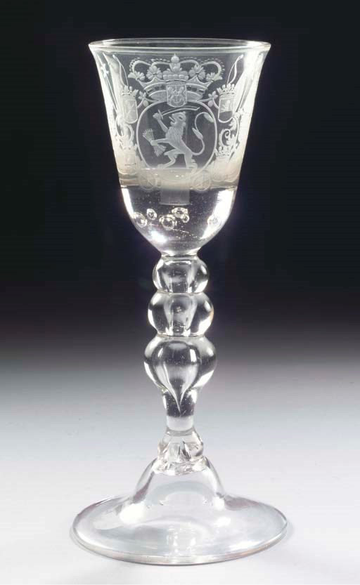 A Dutch engraved armorial goblet