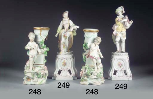 (2)  A pair of Derby porcelain mythological candlestick groups