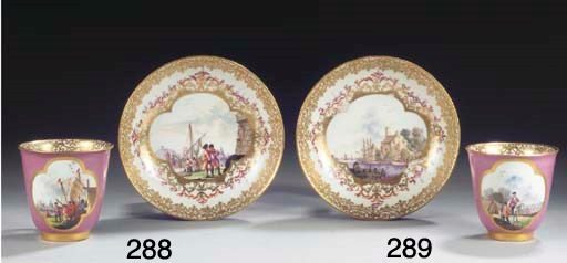 (2) A Meissen porcelain gilt purple-ground landscape chocolate cup and saucer