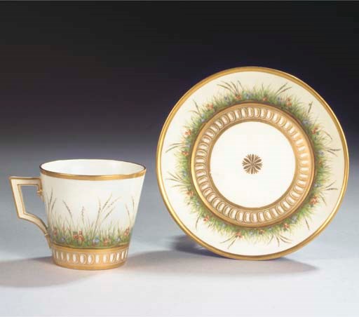 (2)  A Berlin KPM porcelain conical cabinet cup and saucer