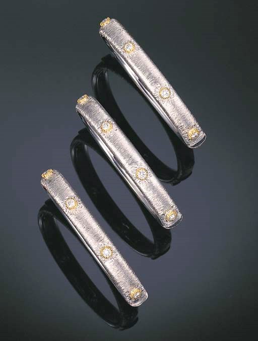 THREE 18K TWO-COLOURED GOLD AND DIAMOND BANGLES